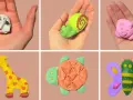 Collection de petits animaux en pâte à sel : vache, escargot, cochon, girafe, tortue et papillon.