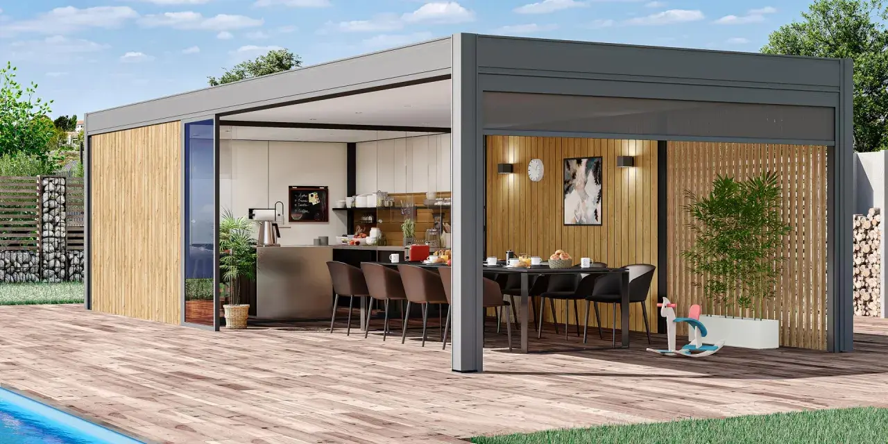 Un pool house moderne avec cuisine d'été, parfait pour des repas en plein air.