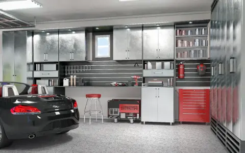 Aménagement garage 15m2 : voiture noire, établis, outils, armoires métalliques et un générateur.