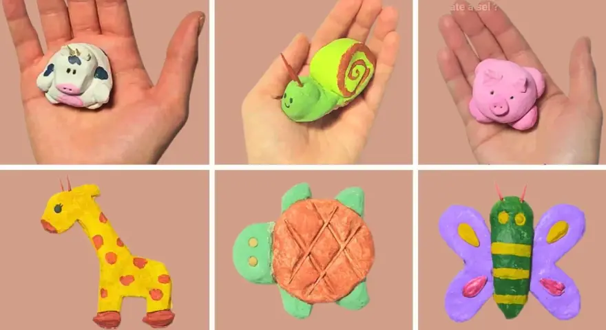 Collection de petits animaux en pâte à sel : vache, escargot, cochon, girafe, tortue et papillon.